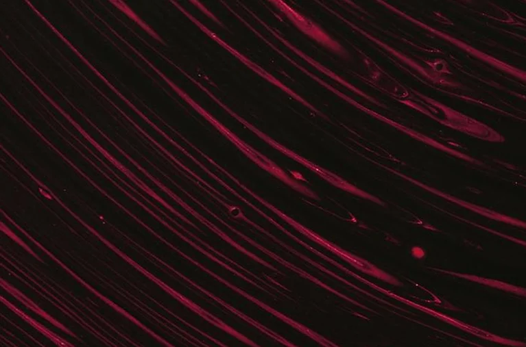 a close up of a red surface
