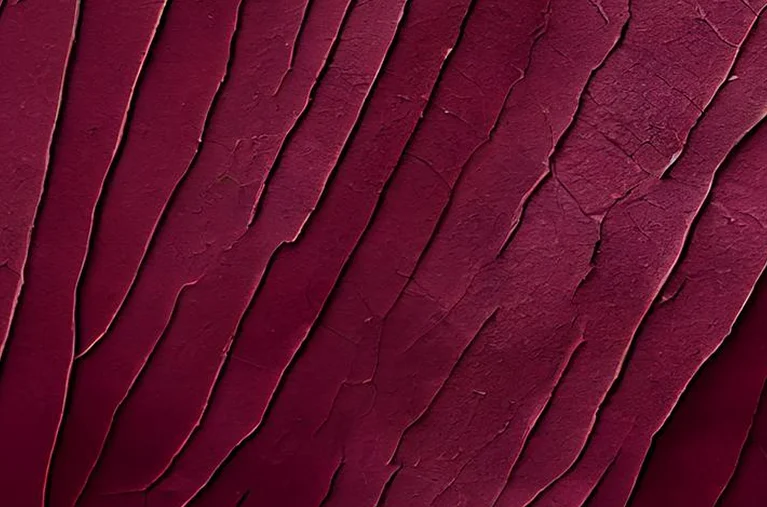 a close up of a red surface
