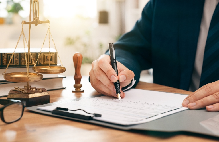 Lawyer is signing document