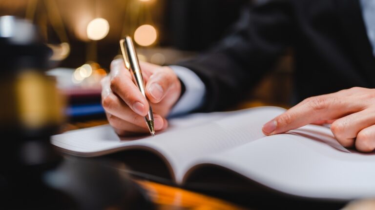 Man is working with documents