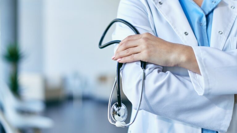 doctor holding stethoscope