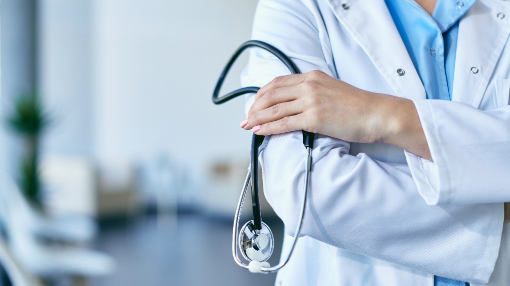 doctor holding stethoscope