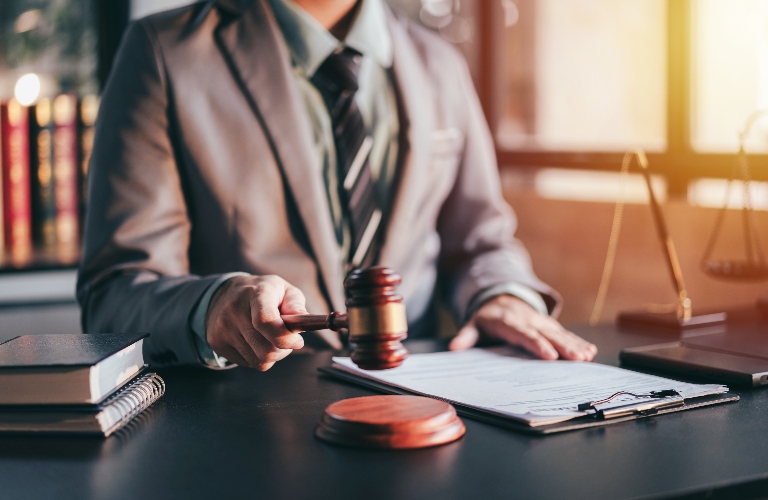 Lawyer is holding judge's gavel