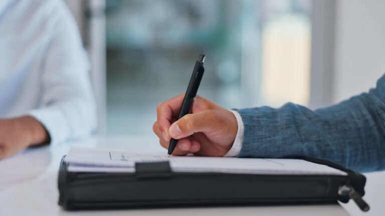 Lawyer is signing documents