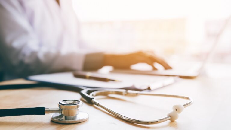 doctor is using laptop