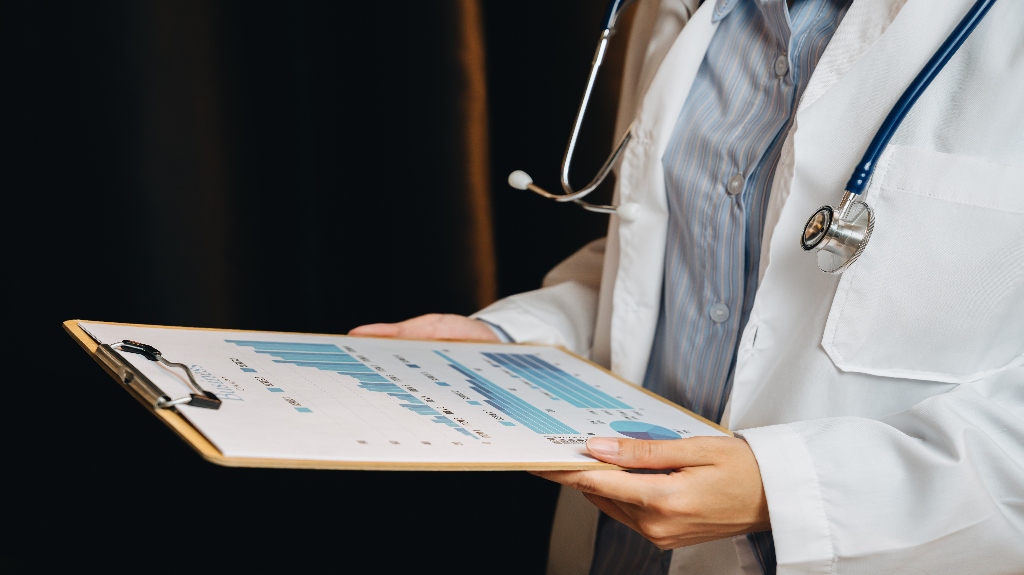 doctor reviewing clipboard