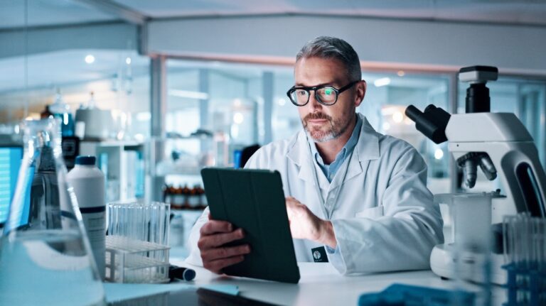 doctor reviewing tablet