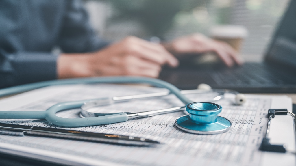 stethoscope on documents